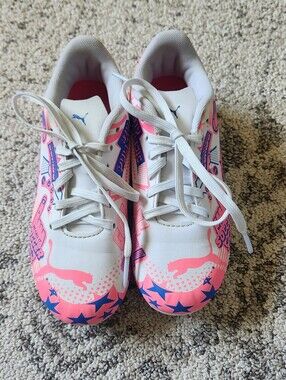 Puma Kids Soccer Cleats with Pink and Blue Graphic Accents